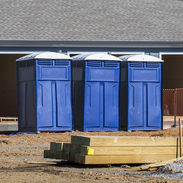 what is the maximum capacity for a single porta potty in Alzada